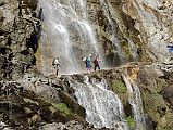 08 The Trail From Tal Towards Khotro Passes Under A Waterfall On The Annapurna Circuit 
